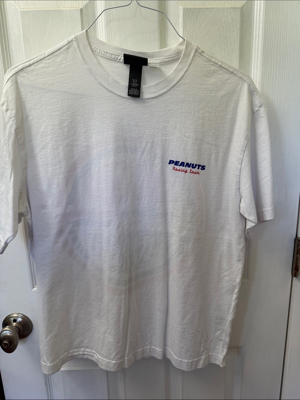 Peanuts White Short-Sleeve Graphic Tee with Blue & Red Logo